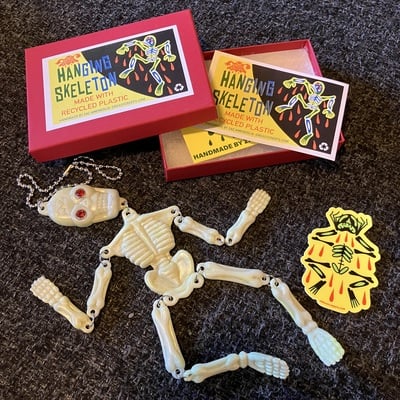Recycled plastic hanging skeleton glow in the dark