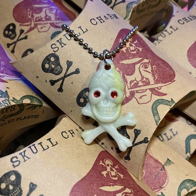 Glowing skull charm necklace (on ball chain)  - made with recycled plastic 