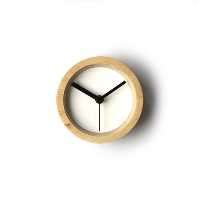 Small handmade round wall clock made of natural plywood - compact