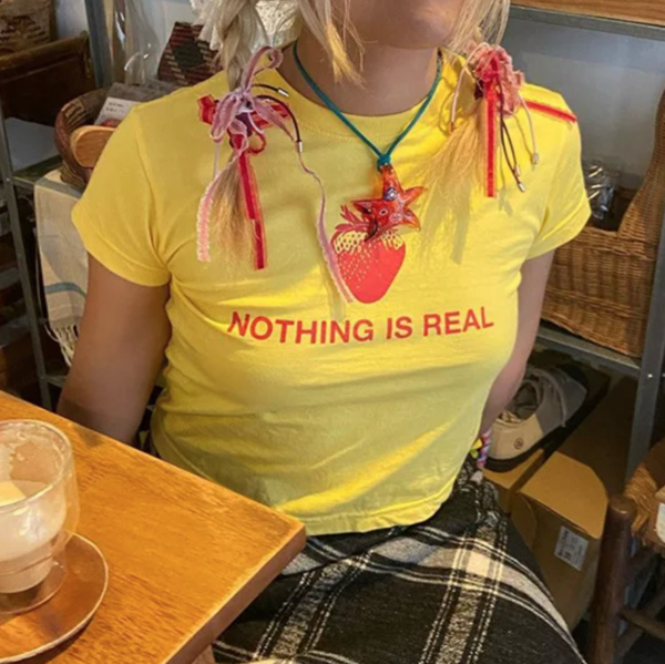 NOTHING IS REAL BABY TEE