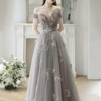 Beautiful tulle floor length prom dress with feathers - Thumbnail 1