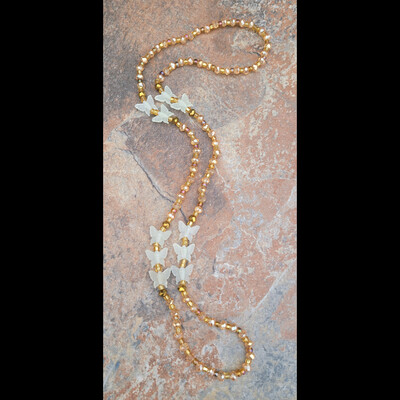 Butterfly rose gold 🌹✨️ glow in the dark crystal handmade waist beads by nubian collection artwear 🎨 