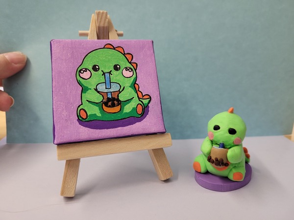 Boba Dino figure and painting