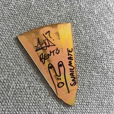 4ish inch piece of signed chopper cymbal!