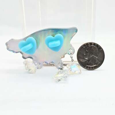 Holographic pin: crying stars