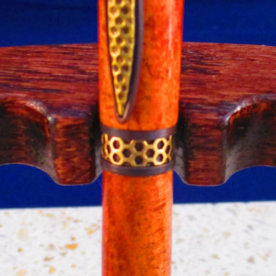 #68 gold / black honeycomb trim