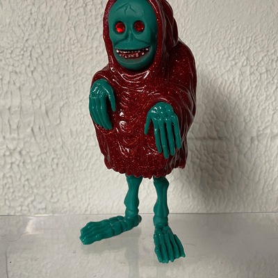  the creep red glitter and green bones