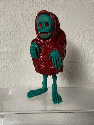  the creep red glitter and green bones