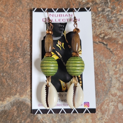 Green sundress 💚👗 handmade earrings by nubian collection artwear 👑