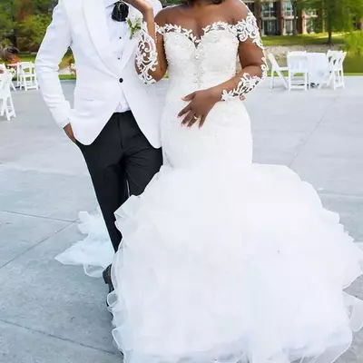 Plus size wedding dresses long sleeves mermaid bridal gowns applique lace beaded sheer neckline ruffles sweep train 