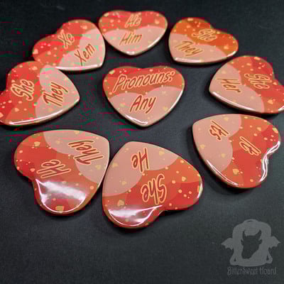 Orange heart pronoun button