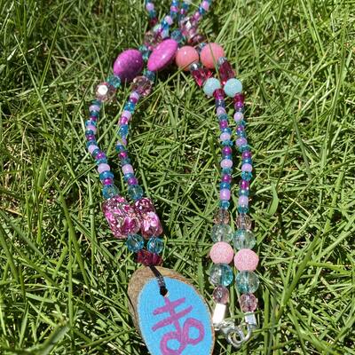 Pastel leviathan cross beaded necklace
