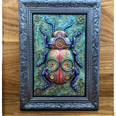 Steampunk rainbow beetle framed polymer clay sculpture 