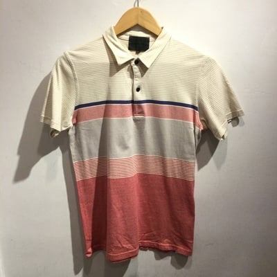Norikoike pale colored polo