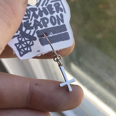 Little crucifix earring