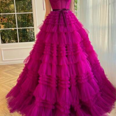 A line strapless fuchsia tiered long tulle prom dress