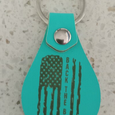 #249 back the blue leatherette keyring