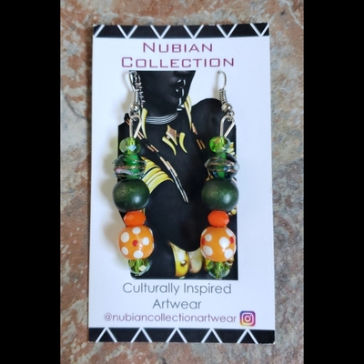 Orange & green me🐍🧡💚 ready-made earrings by nubian collection artwear 🎨