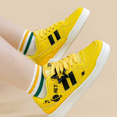 Yellow planet sneakers