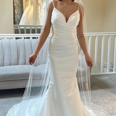 Spaghetti strap backless trumpet long wedding dress