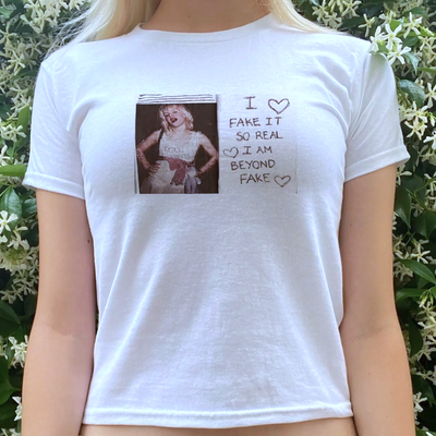I fake it so real i am beyond fake baby tee