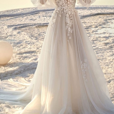 A-line off-the-shoulder court train wedding dress