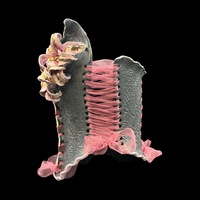 Golden Lily wearable ceramic corset by: Nicole Moan on Display at 50 Penn Place Art Gallery with display stand  - Thumbnail 2