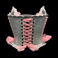 Golden Lily wearable ceramic corset by: Nicole Moan on Display at 50 Penn Place Art Gallery with display stand  - Thumbnail 4