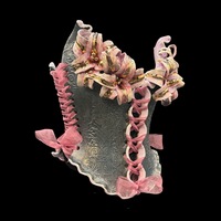 Golden Lily wearable ceramic corset by: Nicole Moan on Display at 50 Penn Place Art Gallery with display stand  - Thumbnail 7