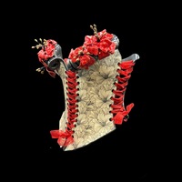 Red Poppy wearable ceramic corset by: Nicole Moan on display at 50 Penn Place Art Gallery with matching stand - Thumbnail 1