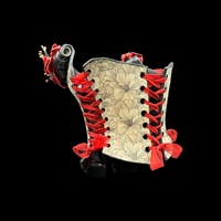 Red Poppy wearable ceramic corset by: Nicole Moan on display at 50 Penn Place Art Gallery with matching stand - Thumbnail 3
