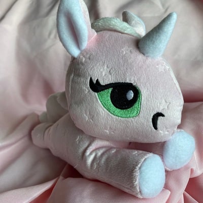 Pink unicorn plushie