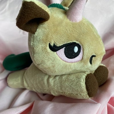 Brown unicorn plushie