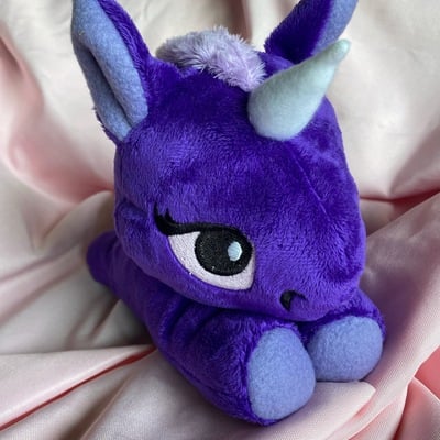 Purple unicorn plushie