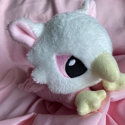 Pink griffin plushie