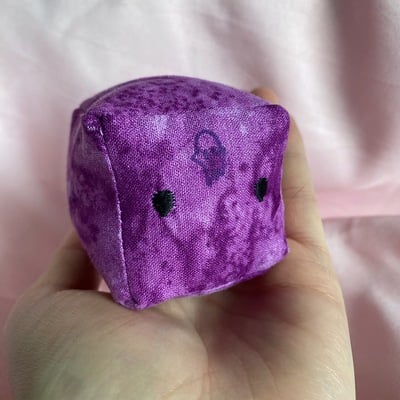 Purple jellycube cat toy