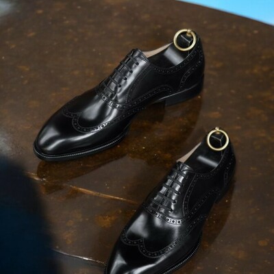 Handmade men's bespoke choice black wingtip shoes
