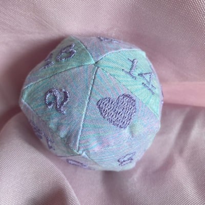 Purple/green d20 cat toy