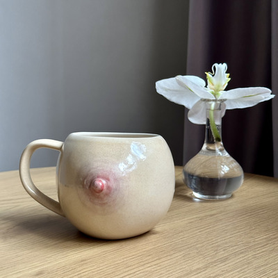 "Handmade Ceramic Mug – Unique Pierced Breast Design for Bold Art Lovers"