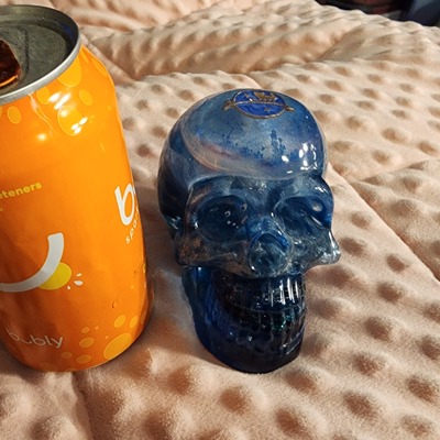 Blue sparkly resin skull