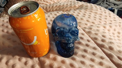 Blue sparkly resin skull