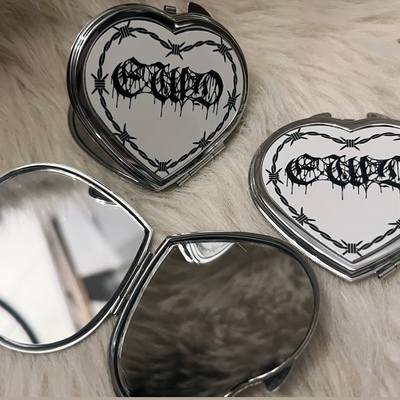 Heavy metal mirror compacts 