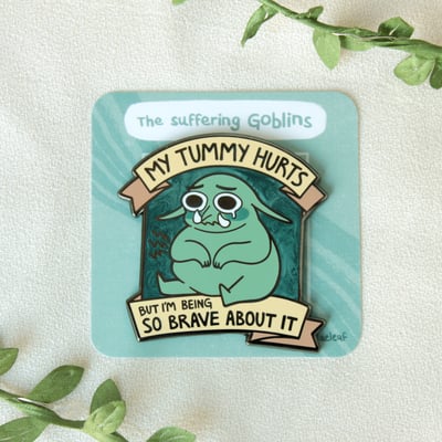 My tummy hurts enamel pin