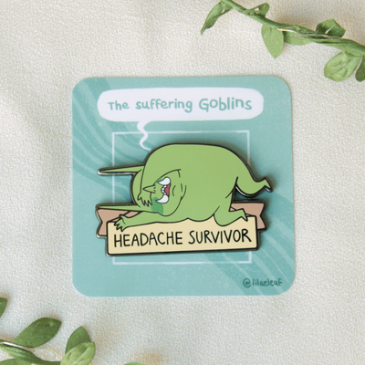 Headache survivor enamel pin