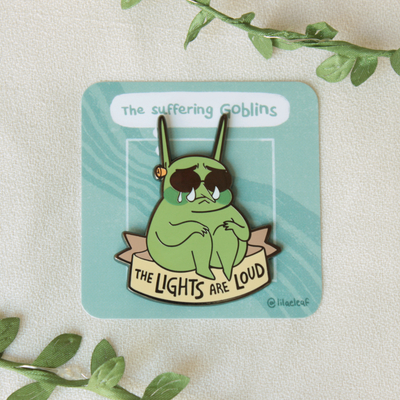 The lights are loud enamel pin