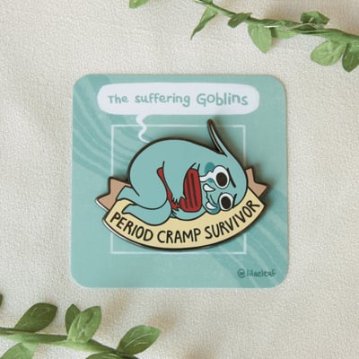 Period cramp survivor enamel pin