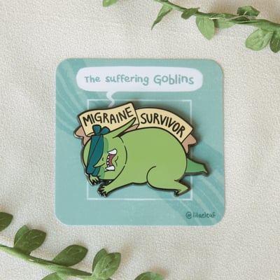 Migraine survivor enamel pin
