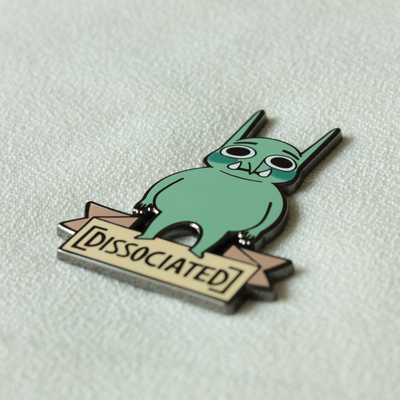 Dissociated enamel pin