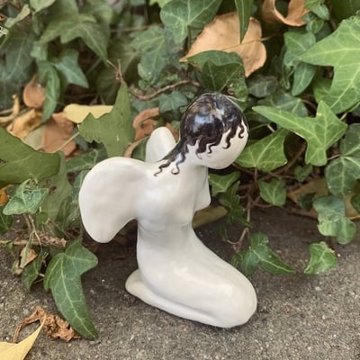 Kneeling angel