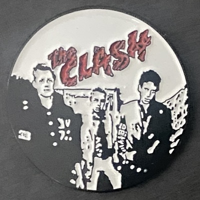 The clash enamel badge